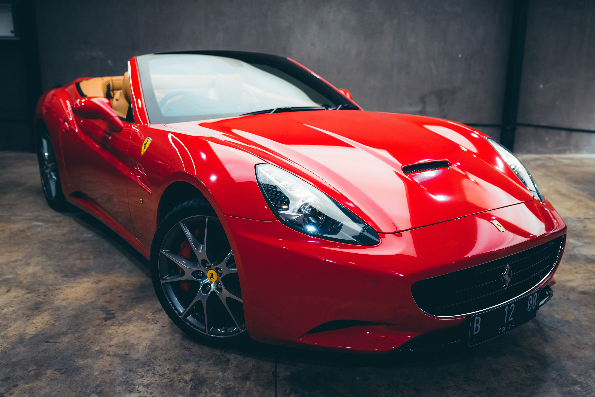 Luxury sports car with shiny hood in garage